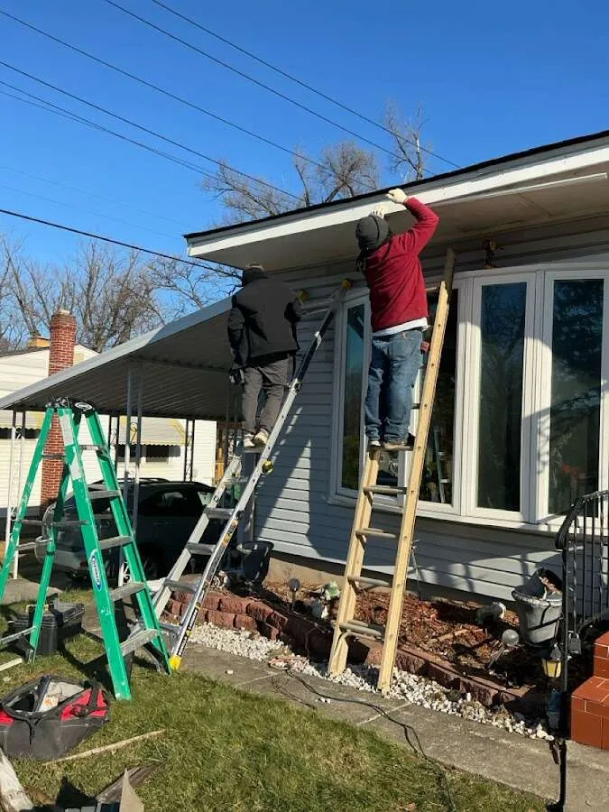 Restoration crew performing exterior repair in Long Lake