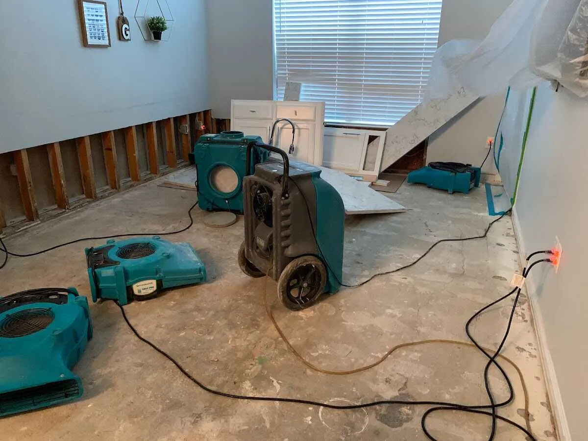 Dehumidifier in flood-cut room for Water Damage Restoration in Long Lake